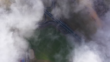 Above-clouds-fields-and-road-highway-in-France-Auvergne